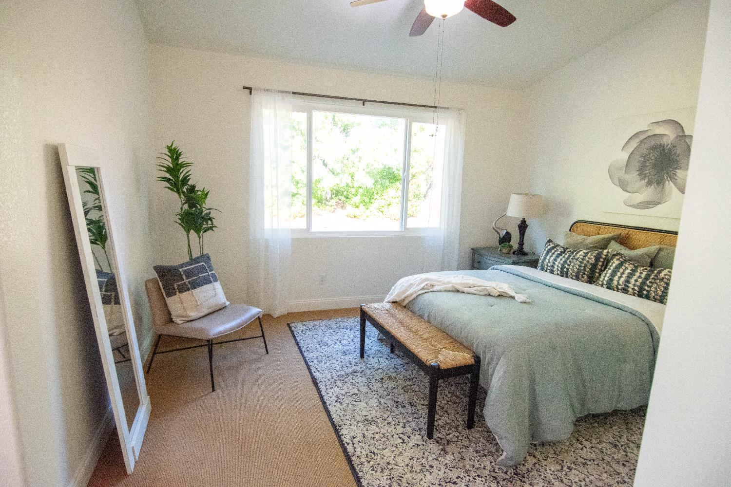 105 Whiting Way Folsom, CA 95630 - Photo 24 of 78 a bedroom with a bed and a window