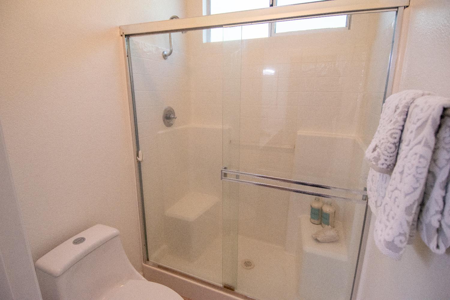105 Whiting Way Folsom, CA 95630 - Photo 30 of 78 a bathroom with a shower and toilet