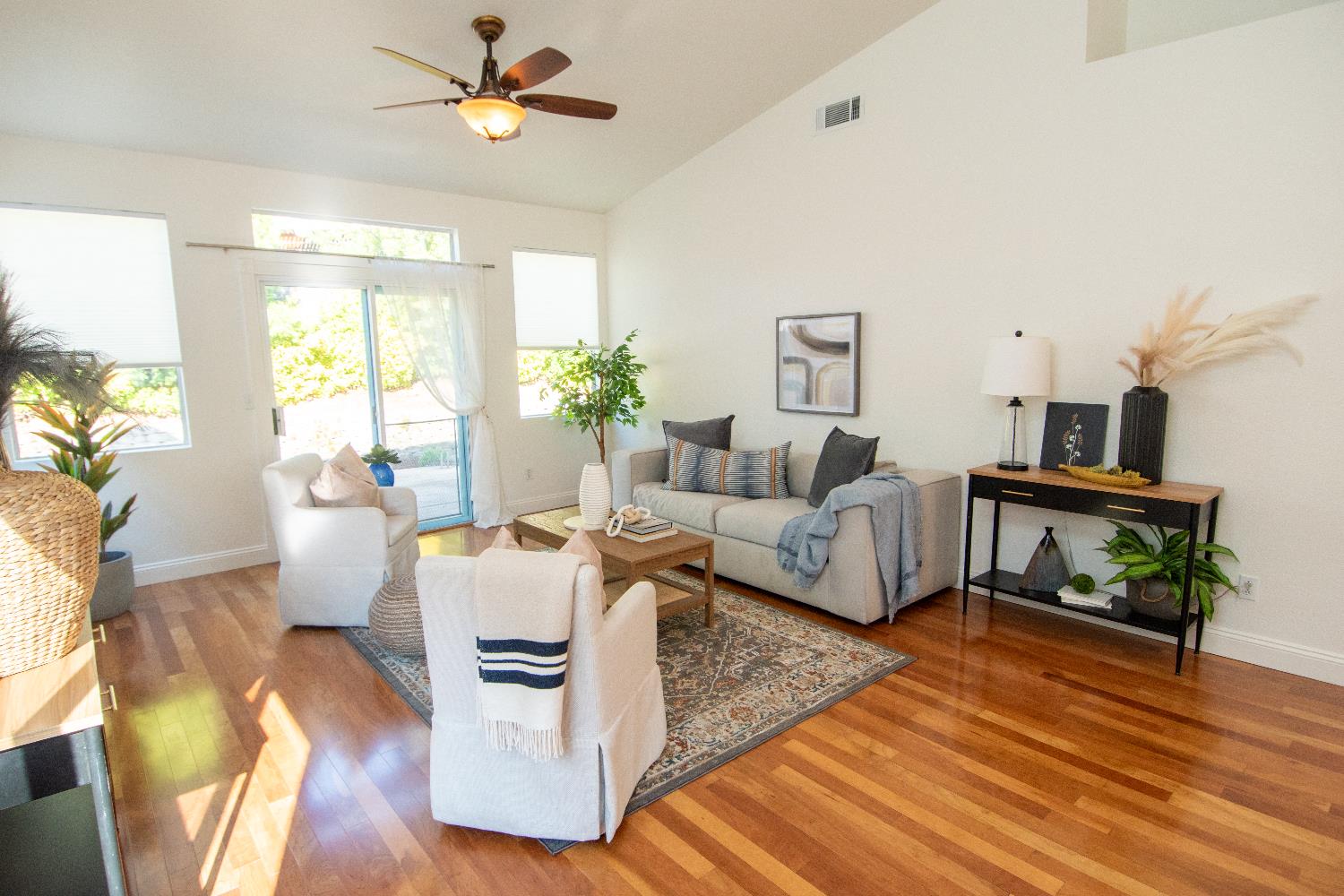 105 Whiting Way Folsom, CA 95630 - Photo 3 of 78 a living room with furniture and a wooden floor