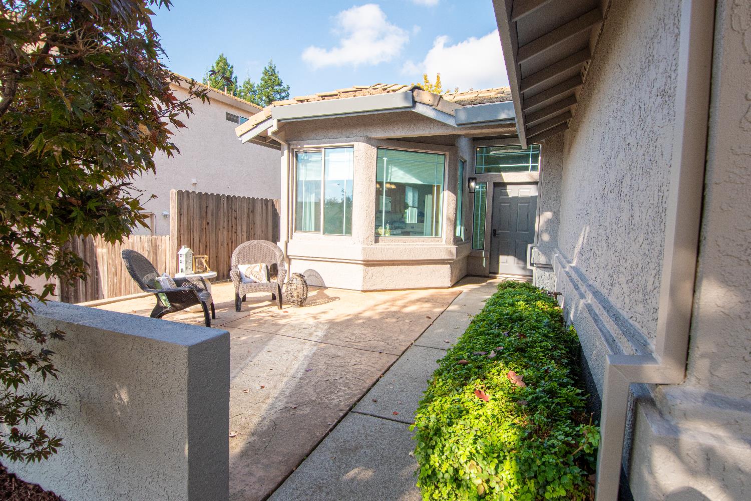 105 Whiting Way Folsom, CA 95630 - Photo 65 of 78 a front view of a house with garden