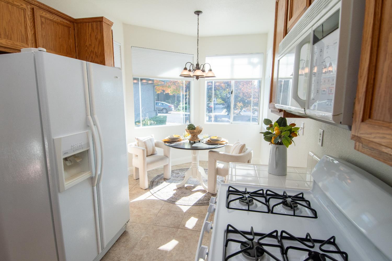 105 Whiting Way Folsom, CA 95630 - Photo 7 of 78 a kitchen with stainless steel appliances a refrigerator and a stove
