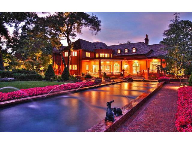 a view of swimming pool with outdoor seating