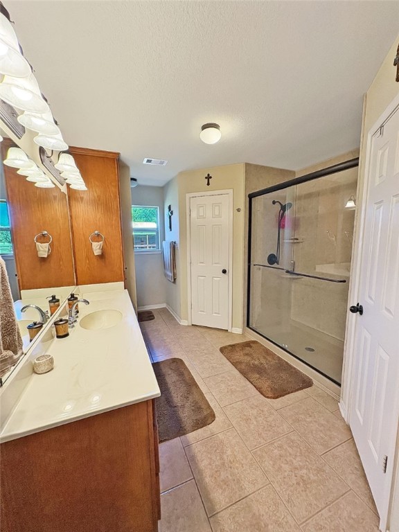 1228 Cr 348 Loop Gause, TX 77857 - Photo 14 of 46 a spacious bathroom with a shower sink and mirror