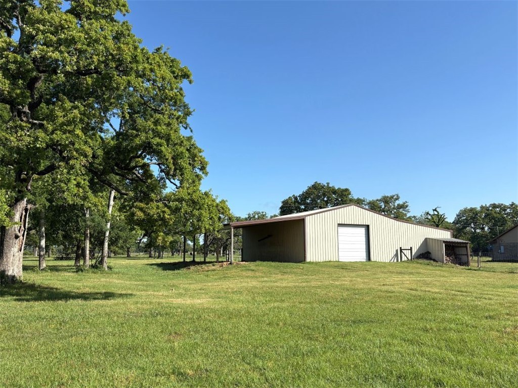 1228 Cr 348 Loop Gause, TX 77857 - Photo 21 of 46 a front view of a house with a yard