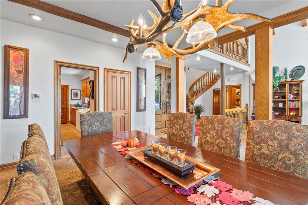 145 Pheasant Run Lake Arrowhead, CA 92352 - Photo 16 of 65 a living room with furniture rug and wooden floor