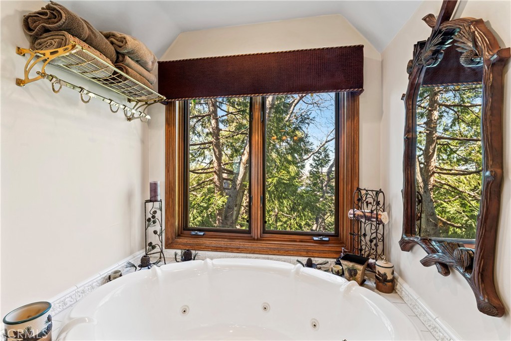 145 Pheasant Run Lake Arrowhead, CA 92352 - Photo 35 of 65 a bathroom with a tub and a sink