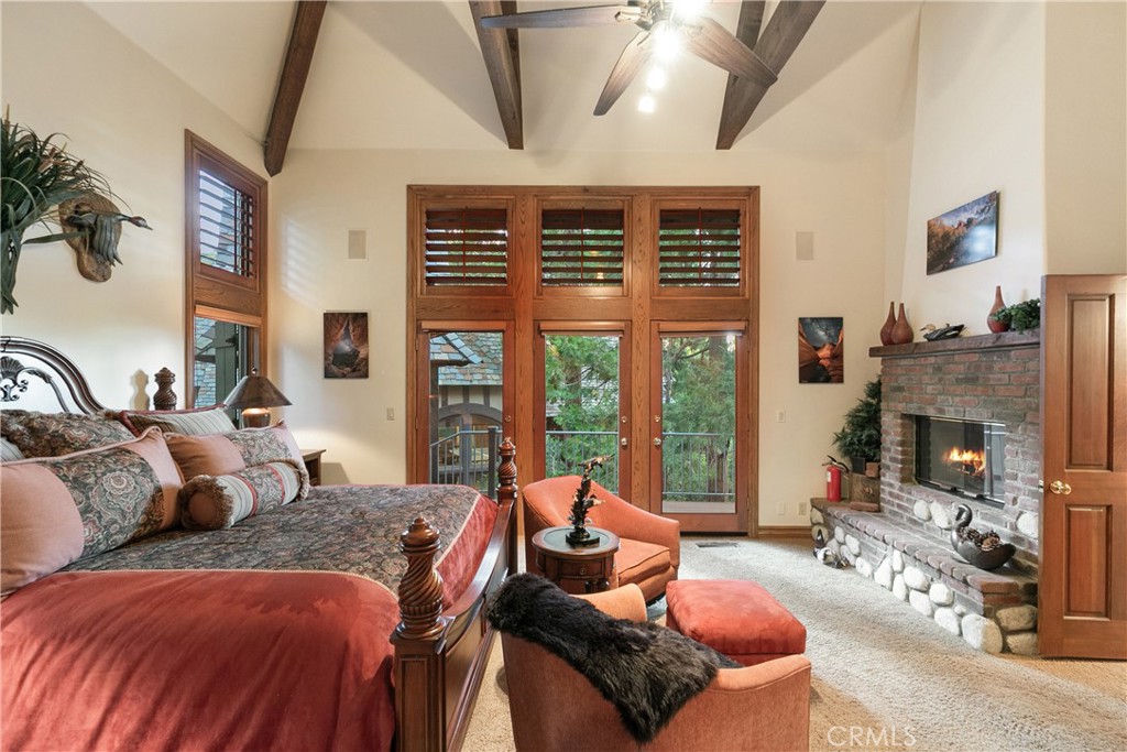 145 Pheasant Run Lake Arrowhead, CA 92352 - Photo 6 of 65 a living room with furniture and a fireplace