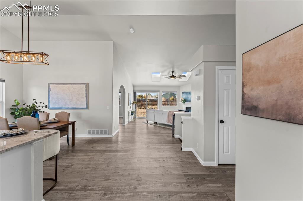 8168 Oliver Road Peyton, CO 80831 - Photo 11 of 42 a living room with furniture and a wooden floor