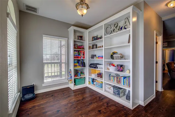 a view of room with rug and window