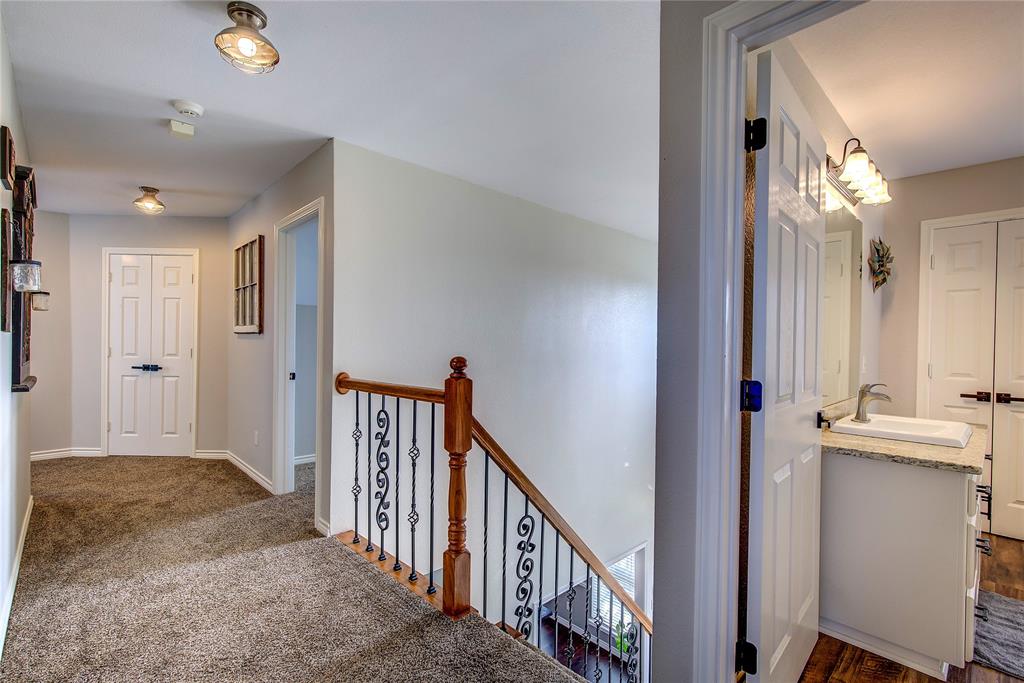 5611 County Road 4705 Commerce, TX 75428 - Photo 19 of 38 a view of a hallway view with staircase