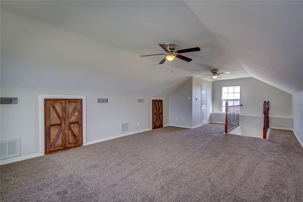 5611 County Road 4705 Commerce, TX 75428 - Photo 25 of 38 a view of a livingroom with a ceiling fan