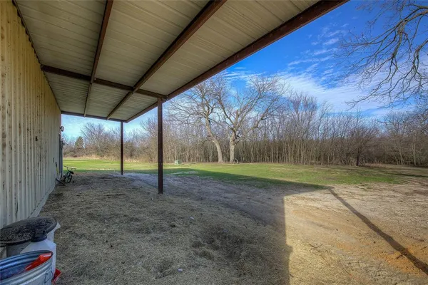 a view of a backyard with of trees