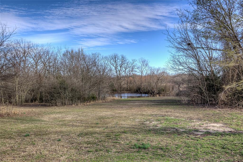 5611 County Road 4705 Commerce, TX 75428 - Photo 32 of 38 a view of a yard