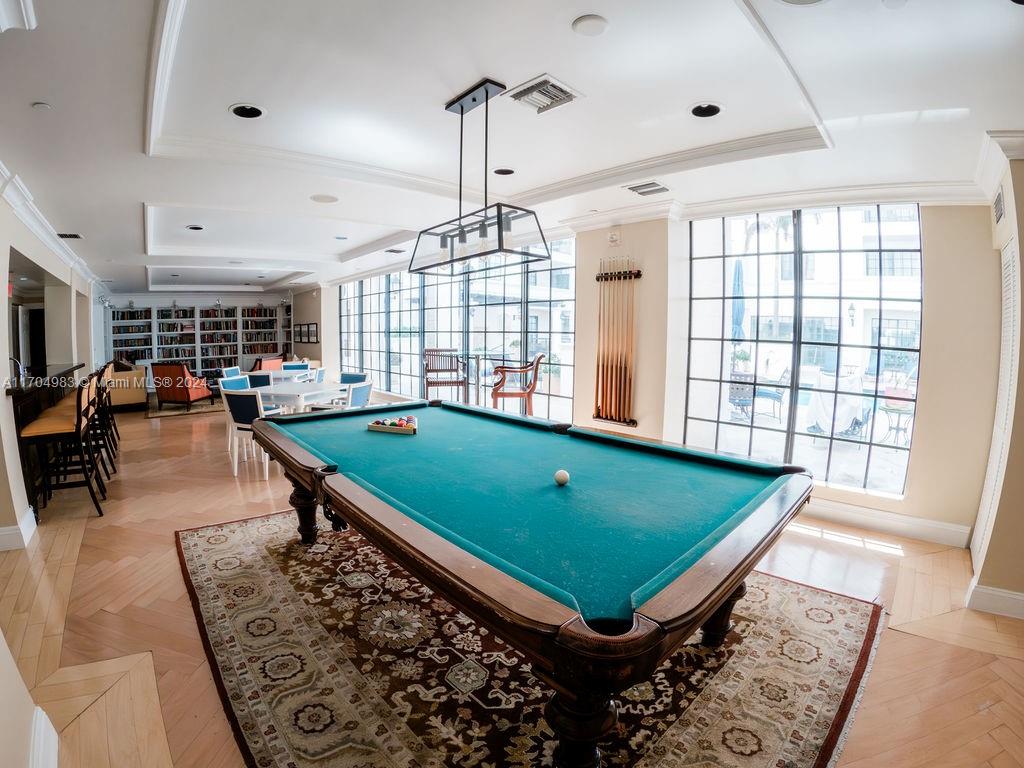 233 South Federal Highway, Unit 723 Boca Raton, FL 33432 - Photo 11 of 35 a room with pool table and windows