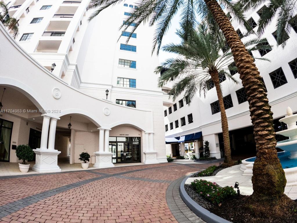 233 South Federal Highway, Unit 723 Boca Raton, FL 33432 - Photo 15 of 35 a front view of a building with a umbrellas