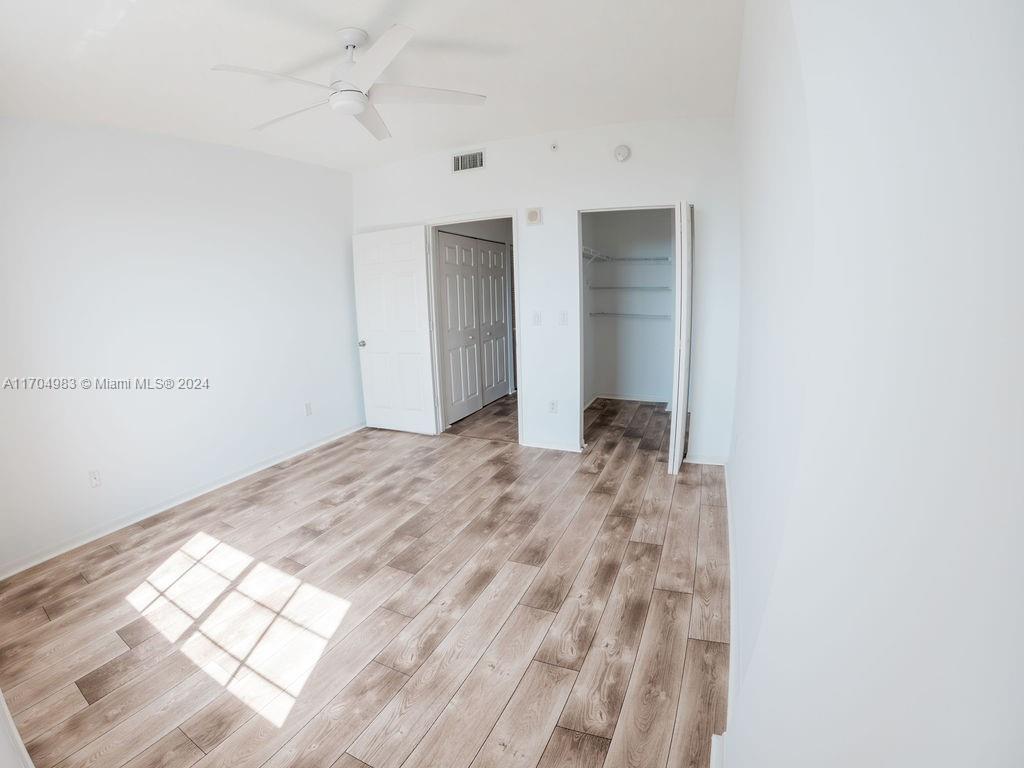 233 South Federal Highway, Unit 723 Boca Raton, FL 33432 - Photo 29 of 35 a view of a room with wooden floor and entryway