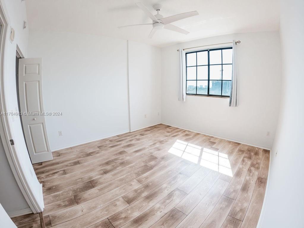 233 South Federal Highway, Unit 723 Boca Raton, FL 33432 - Photo 30 of 35 an empty room with windows