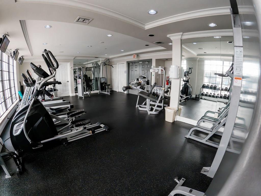 233 South Federal Highway, Unit 723 Boca Raton, FL 33432 - Photo 32 of 35 a view of a room with gym equipment