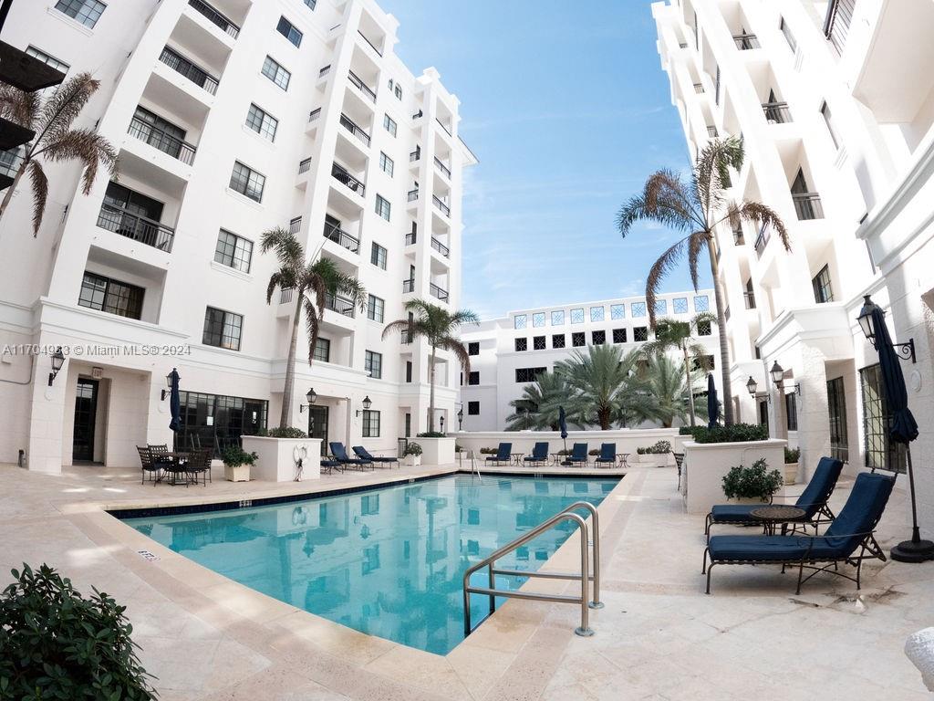 233 South Federal Highway, Unit 723 Boca Raton, FL 33432 - Photo 33 of 35 a view of a swimming pool with outdoor seating