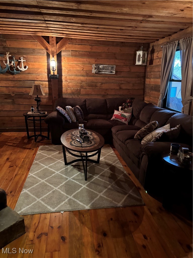 55249 Jim Ball Road Senecaville, OH 43780 - Photo 8 of 14 Living room with hardwood / wood-style floors, wooden walls, and wood ceiling