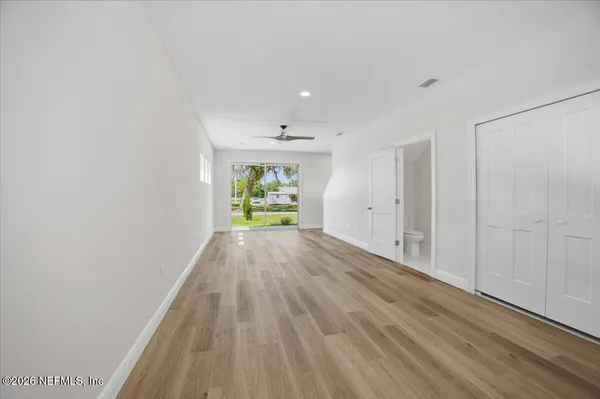 a view of an empty room and window