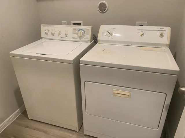 a utility room with dryer and washer