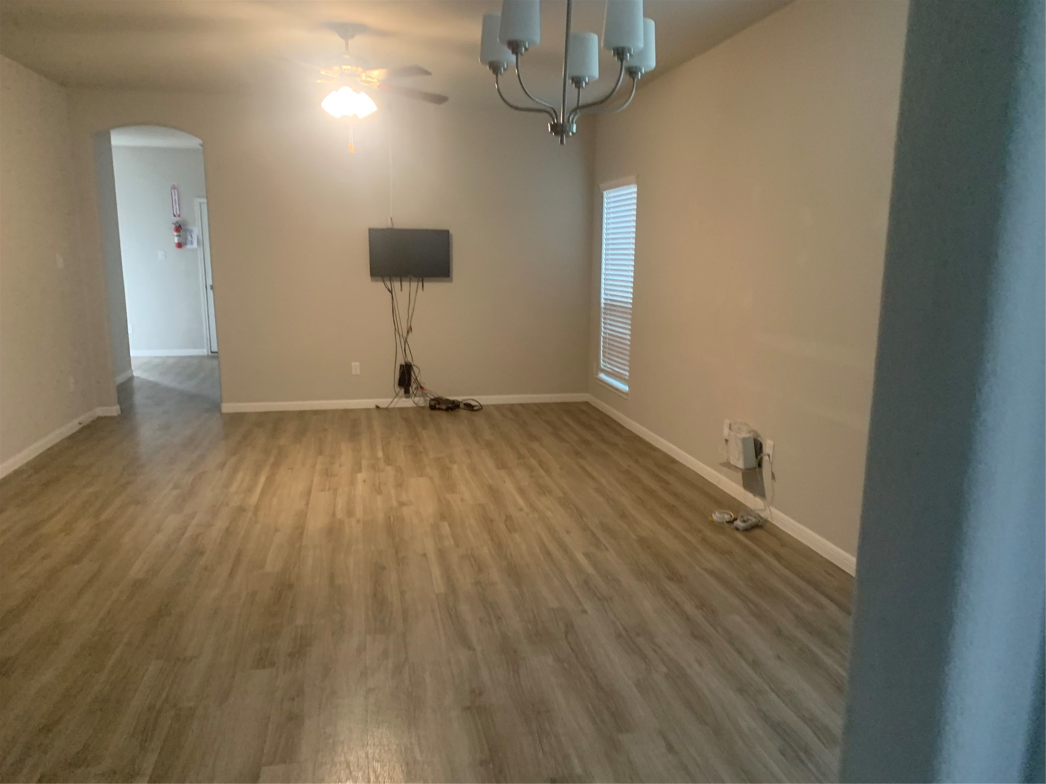 6511 Wenlock Drive Houston, TX 77048 - Photo 21 of 23 a view of room with wooden floor and ceiling fan