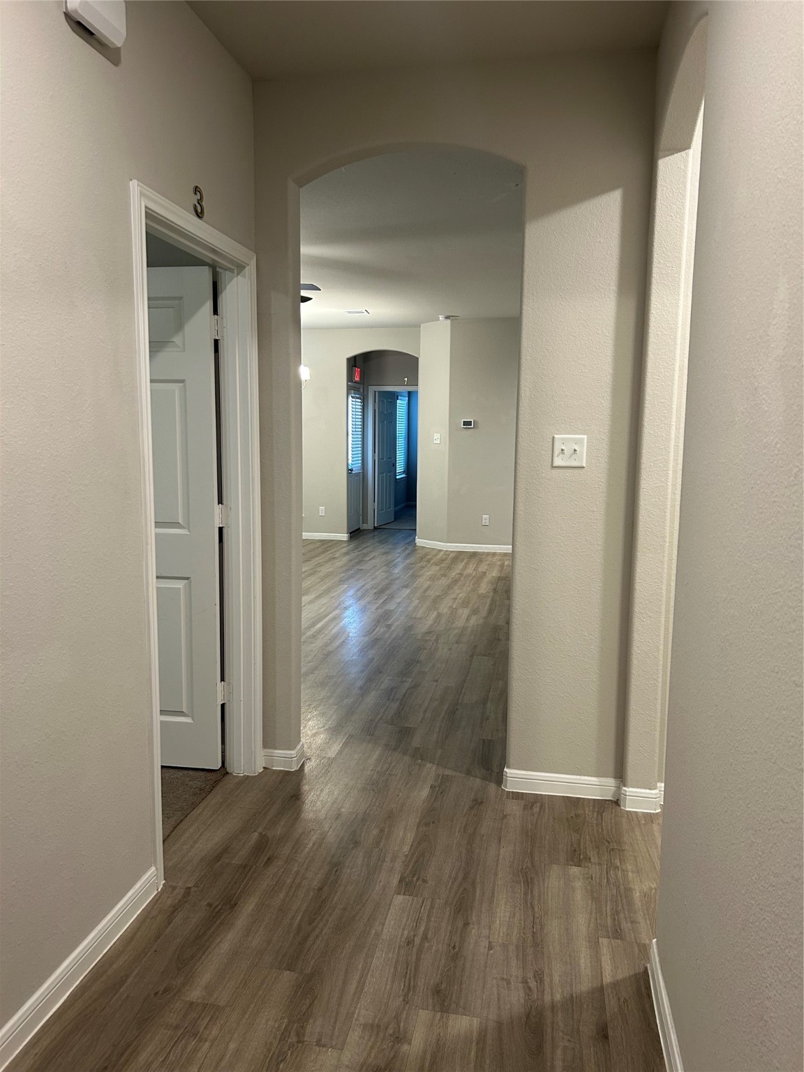6511 Wenlock Drive Houston, TX 77048 - Photo 10 of 23 an empty room with wooden floor and closet