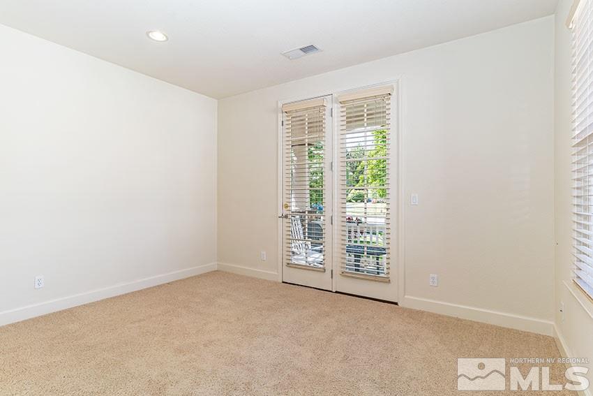 8170 Willow Ranch Trail Reno, NV 89523 - Photo 17 of 23 an empty room with windows