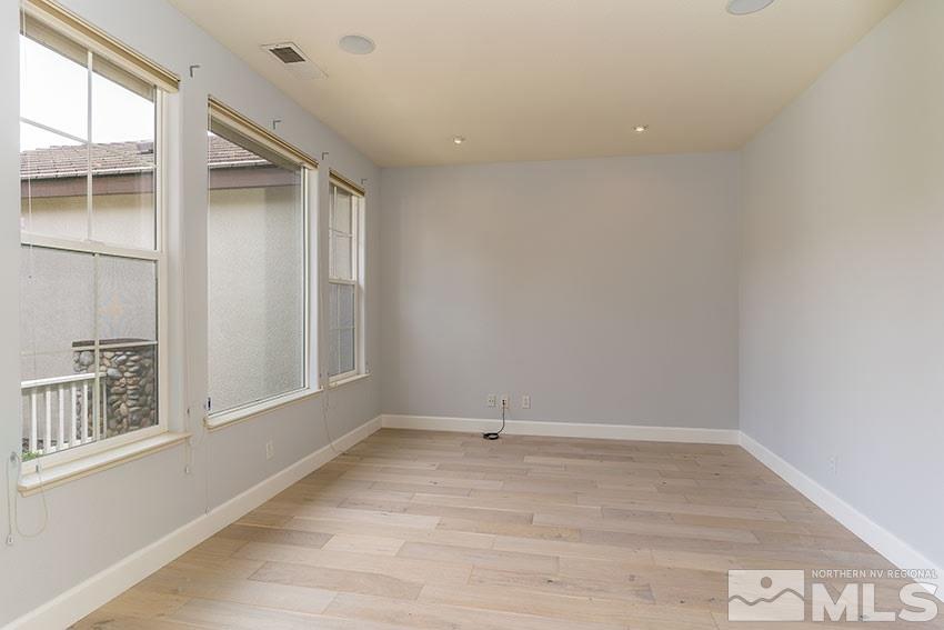 8170 Willow Ranch Trail Reno, NV 89523 - Photo 2 of 23 a view of an empty room with a window