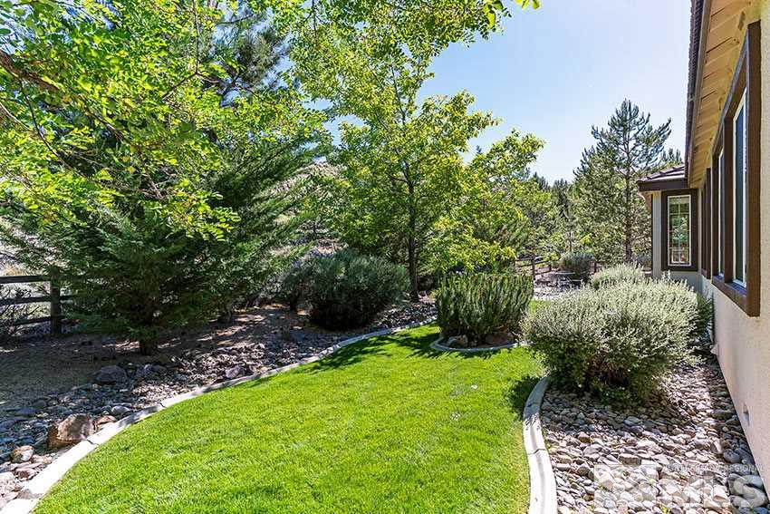 8170 Willow Ranch Trail Reno, NV 89523 - Photo 21 of 23 a view of a backyard with pathway