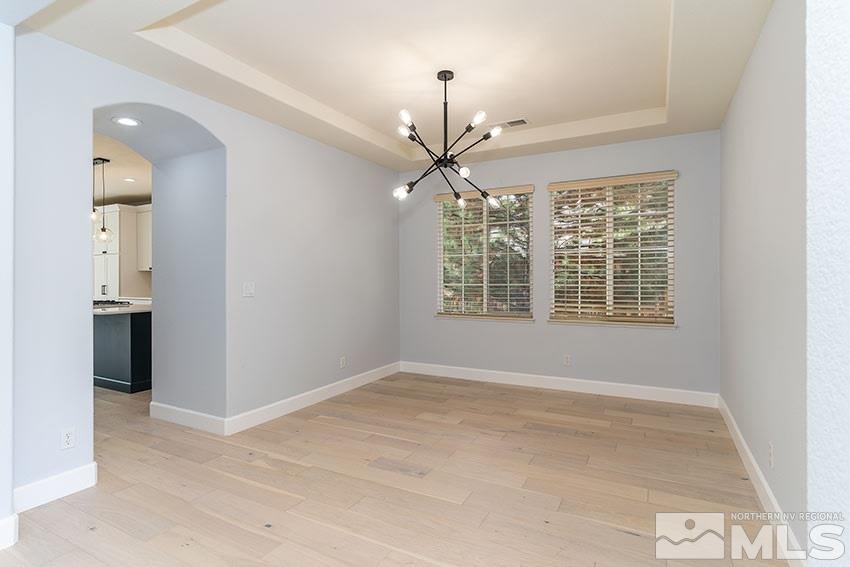 8170 Willow Ranch Trail Reno, NV 89523 - Photo 3 of 23 a view of an empty room with a window