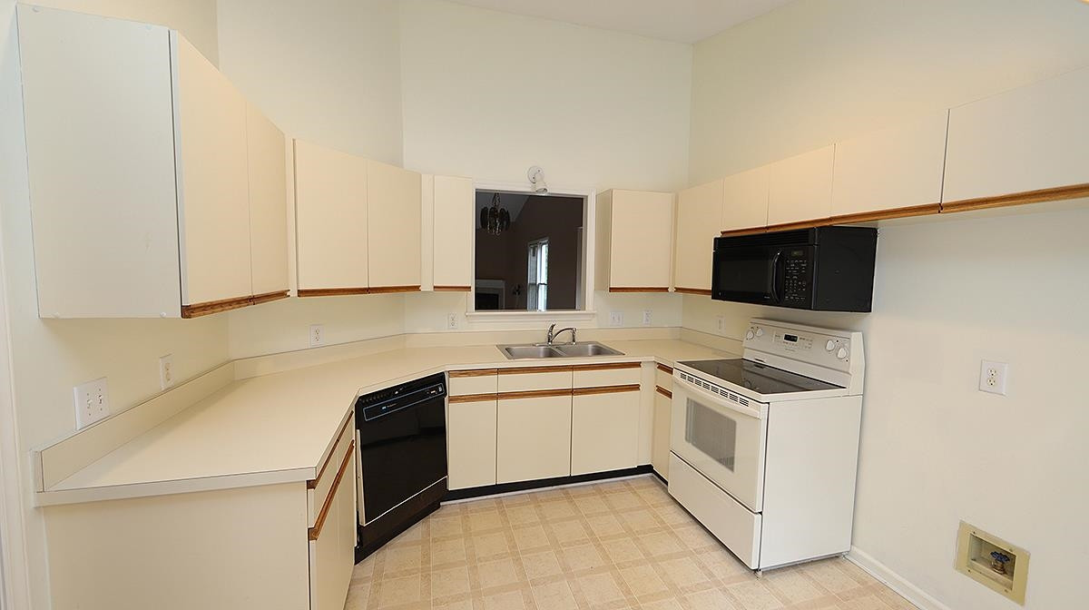 4520 Antique Lane Raleigh, NC 27616 - Photo 2 of 13 This kitchen is easy to work in. It has not been updated but does have a good layout, also with space for a small eating area. Kitchen