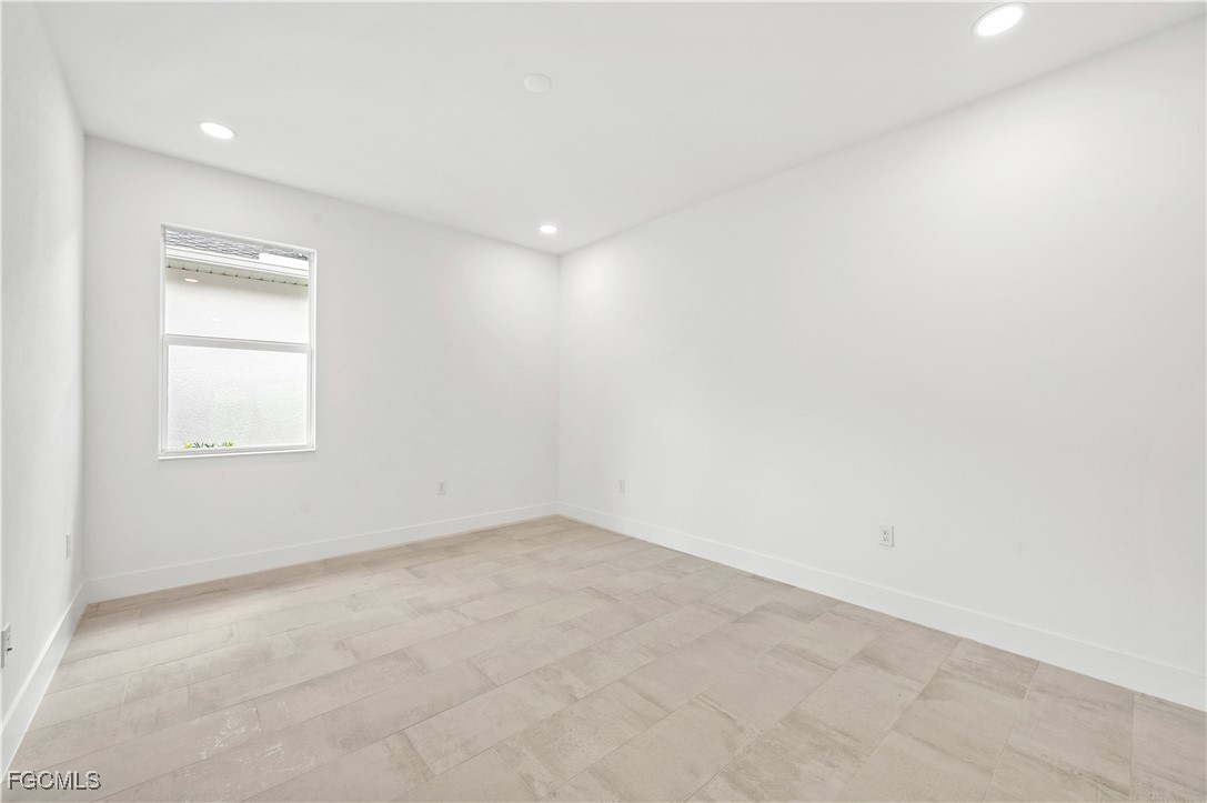 16236 Wax Myrtle Street Punta Gorda, FL 33982 - Photo 15 of 37 an empty room with a window