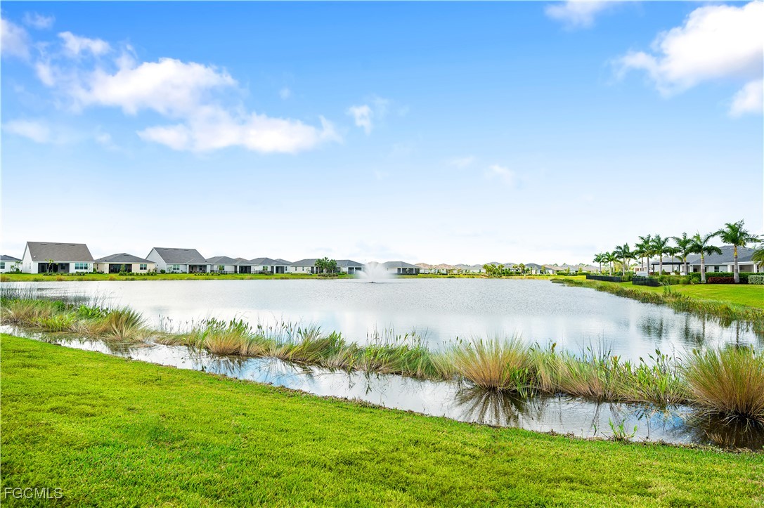 16236 Wax Myrtle Street Punta Gorda, FL 33982 - Photo 3 of 37 a view of a lake with a city
