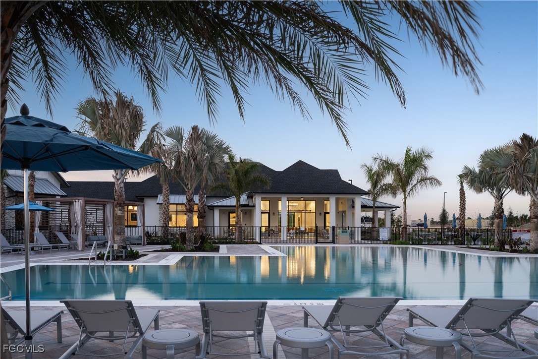 16236 Wax Myrtle Street Punta Gorda, FL 33982 - Photo 36 of 37 a view of house with swimming pool and outdoor seating