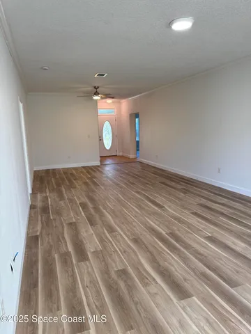 a view of a livingroom with a window