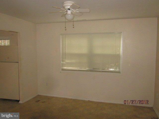 1915 Winder Road Windsor Mill, MD 21244 - Photo 6 of 7 an empty room with a window
