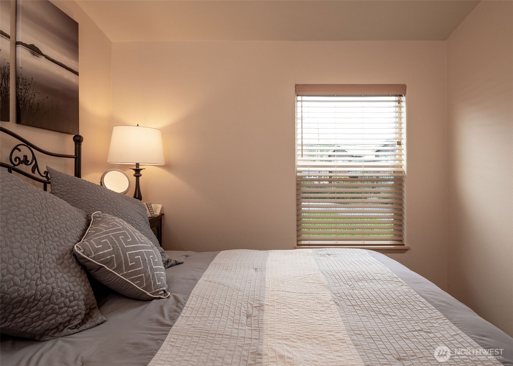 600 Northeast Lincoln Road, Unit 4 Poulsbo, WA 98370 - Photo 20 of 30 a bedroom with a bed and a flat screen tv
