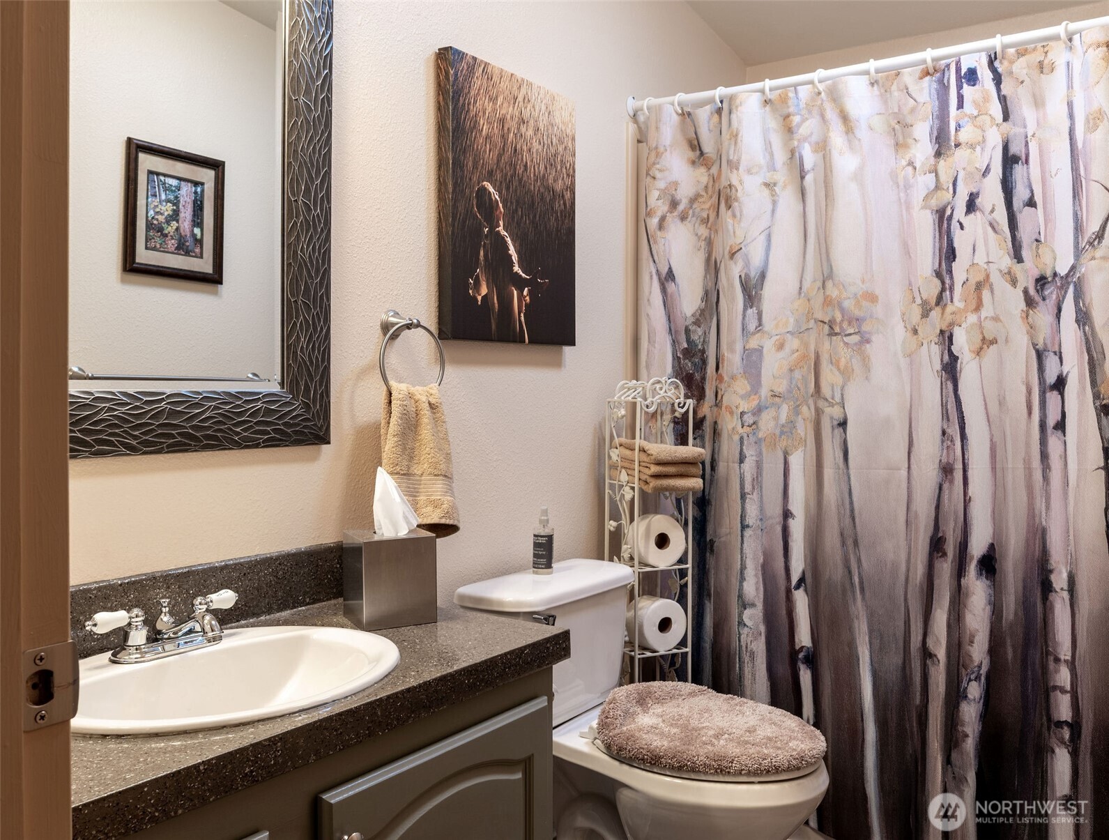 600 Northeast Lincoln Road, Unit 4 Poulsbo, WA 98370 - Photo 21 of 30 a bathroom with a sink toilet and shower