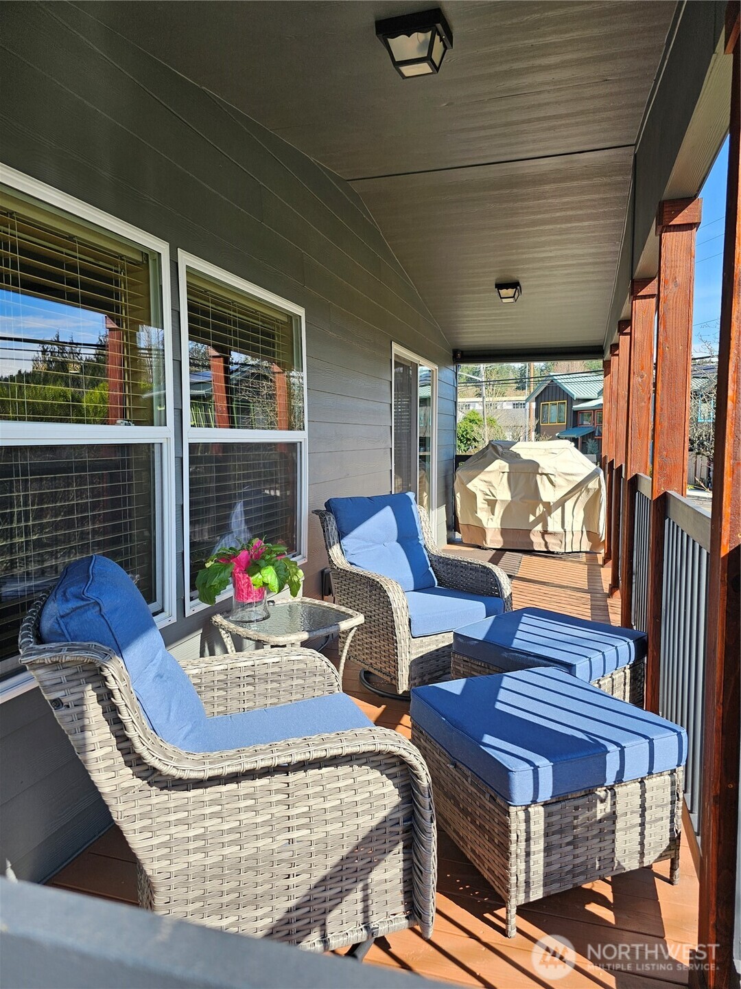 600 Northeast Lincoln Road, Unit 4 Poulsbo, WA 98370 - Photo 29 of 30 a living room with furniture a rug and a window