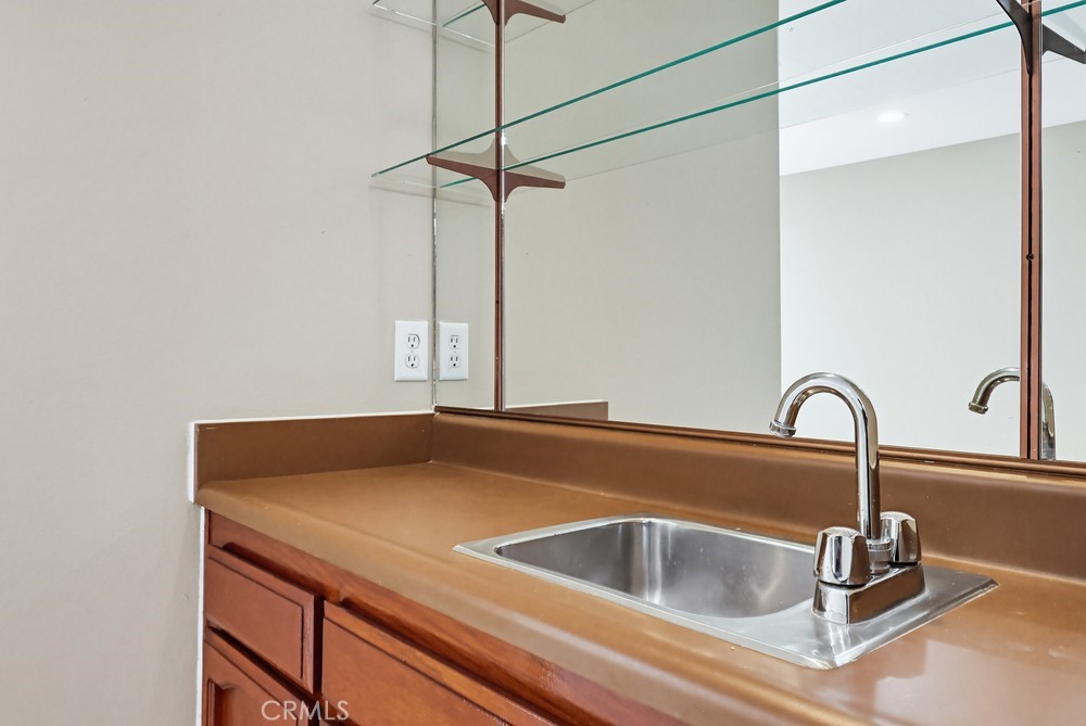 19018 Sherman Way, Unit 110 Reseda, CA 91335 - Photo 17 of 68 a close view of sink and tap