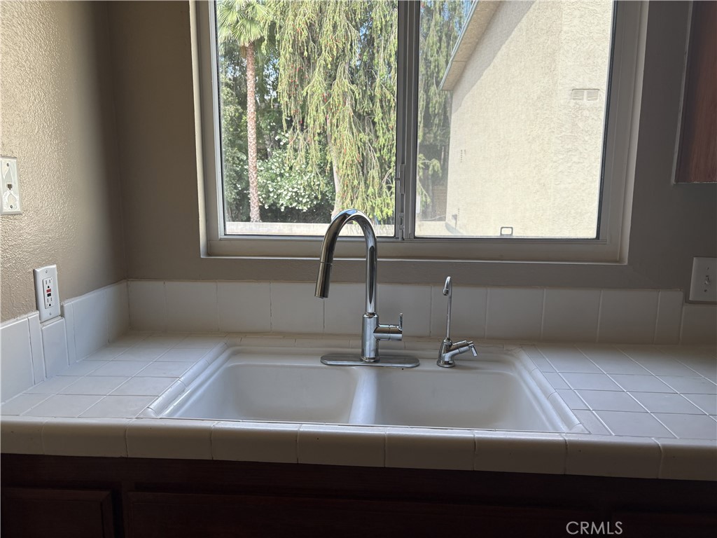 19018 Sherman Way, Unit 110 Reseda, CA 91335 - Photo 21 of 68 a close view of sink and tap