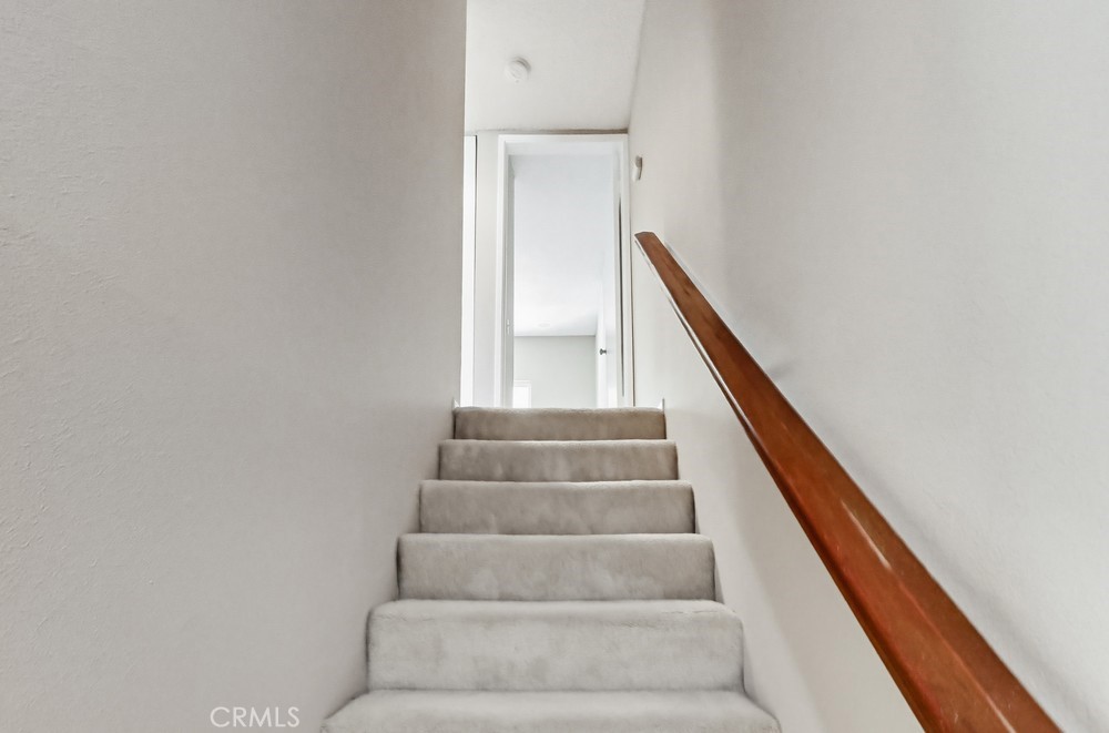 19018 Sherman Way, Unit 110 Reseda, CA 91335 - Photo 28 of 68 a view of staircase with white walls