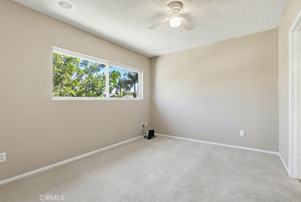 19018 Sherman Way, Unit 110 Reseda, CA 91335 - Photo 31 of 68 an empty room with a window