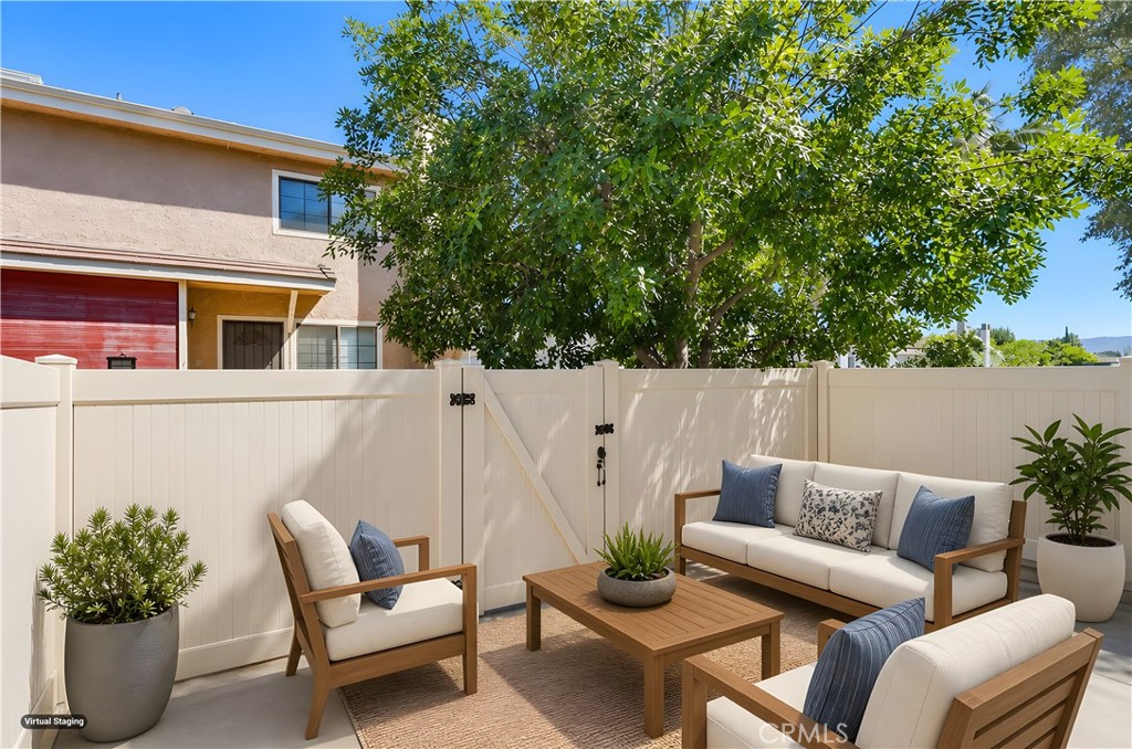19018 Sherman Way, Unit 110 Reseda, CA 91335 - Photo 4 of 68 a outdoor living space with furniture and potted plants