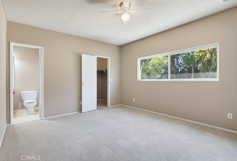19018 Sherman Way, Unit 110 Reseda, CA 91335 - Photo 41 of 68 a view of an empty room with a window