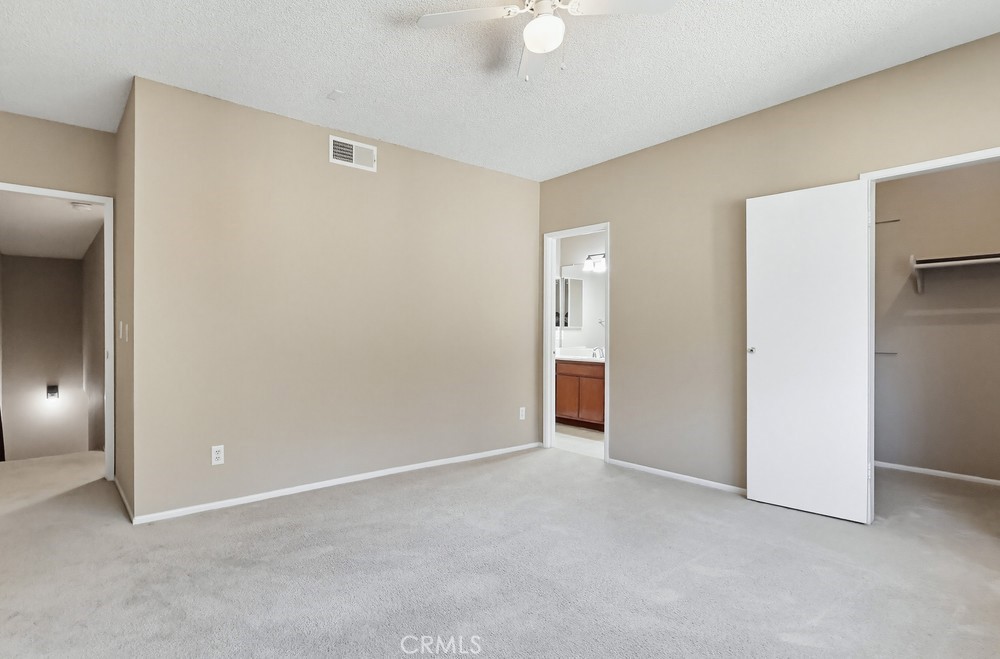 19018 Sherman Way, Unit 110 Reseda, CA 91335 - Photo 45 of 68 a view of an empty room and a bathroom