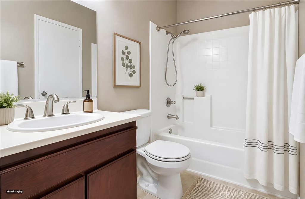19018 Sherman Way, Unit 110 Reseda, CA 91335 - Photo 49 of 68 a bathroom with a sink a toilet and shower