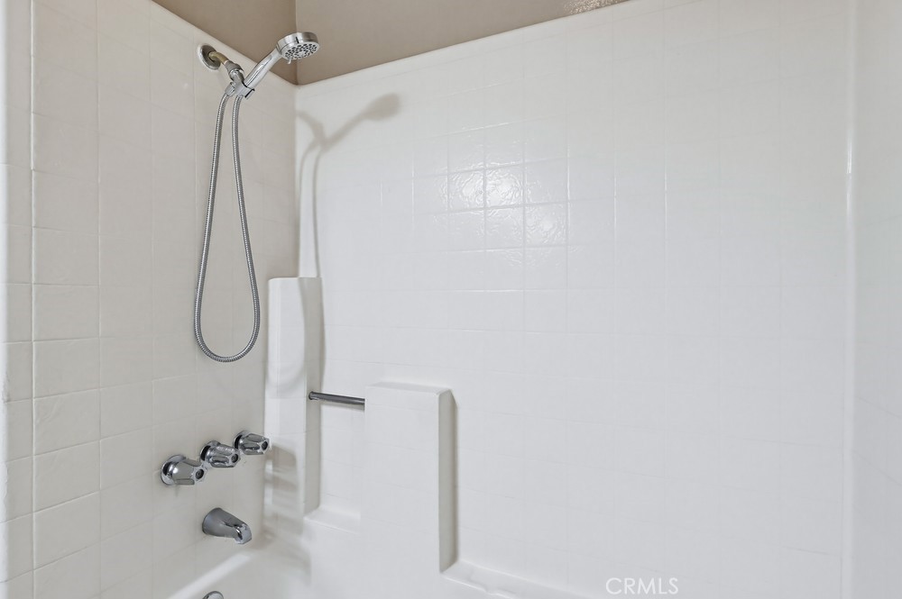 19018 Sherman Way, Unit 110 Reseda, CA 91335 - Photo 50 of 68 a bathroom with a shower
